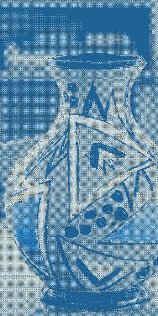 A close-up of a patterned vase.